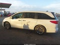2022 Honda Odyssey — photo 14 of 16 | VIN 5FNRL6H73NB064450