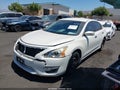 2015 Nissan Altima — photo 2 of 13 | VIN 1N4AL3AP3FC272595