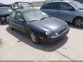 1999 Ford Taurus — photo 1 of 13 | VIN 1FAFP53U2XA124573