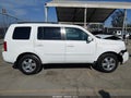 2011 Honda Pilot — photo 13 of 16 | VIN 5FNYF3H77BB014079