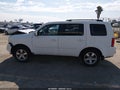 2011 Honda Pilot — photo 14 of 16 | VIN 5FNYF3H77BB014079