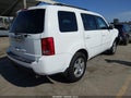 2011 Honda Pilot — photo 4 of 16 | VIN 5FNYF3H77BB014079