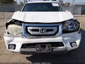 2011 Honda Pilot — photo 6 of 16 | VIN 5FNYF3H77BB014079