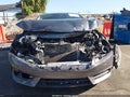 2017 Honda Civic — photo 12 of 16 | VIN 19XFC2F74HE046094