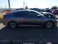 2017 Honda Civic — photo 13 of 16 | VIN 19XFC2F74HE046094