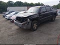 2002 Chevrolet Avalanche — photo 2 of 16 | VIN 3GNEK13TX2G260181