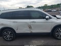 2017 Honda Pilot — photo 13 of 16 | VIN 5FNYF6H05HB024610