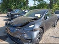 2024 Tesla Model Y — photo 6 of 14 | VIN 7SAYGAEE6RF202383