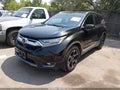 2018 Honda CR-V — photo 2 of 17 | VIN 7FARW2H95JE075238