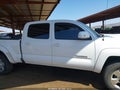 2013 Toyota Tacoma — photo 14 of 17 | VIN 3TMKU4HN2DM037848