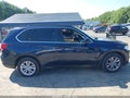 2014 BMW X5 — photo 13 of 16 | VIN 5UXKR0C5XE0H26012