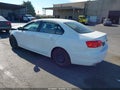 2014 Volkswagen Jetta — photo 3 of 17 | VIN 3VW2K7AJ6EM388842