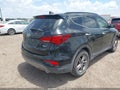 2017 Hyundai Santa Fe — photo 4 of 17 | VIN 5NMZU3LB4HH029684