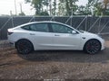 2022 Tesla Model 3 — photo 14 of 21 | VIN 5YJ3E1EC9NF311684