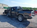 2014 Toyota Tacoma — photo 3 of 16 | VIN 3TMLU4EN0EM162390