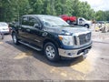2017 Nissan Titan — photo 1 of 11 | VIN 1N6AA1E59HN562261