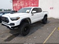 2018 Toyota Tacoma — photo 2 of 16 | VIN 5TFCZ5AN5JX143531