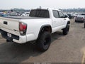 2018 Toyota Tacoma — photo 4 of 16 | VIN 5TFCZ5AN5JX143531