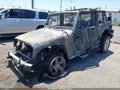 2014 Jeep Wrangler Unlimited — photo 2 of 10 | VIN 1C4HJWEG4EL141720