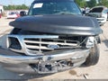2003 Ford F-150 — photo 6 of 15 | VIN 1FTRX17223NB16467