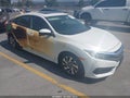 2018 Honda Civic — photo 1 of 16 | VIN 2HGFC2F72JH515551