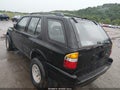 1998 Isuzu Rodeo — photo 3 of 11 | VIN 4S2CM58W4W4305644