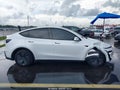 2026 Tesla Model Y — photo 12 of 15 | VIN 7SAYGDED2TA477066