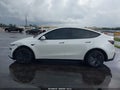 2026 Tesla Model Y — photo 13 of 15 | VIN 7SAYGDED2TA477066