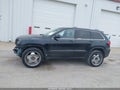 2012 Jeep Grand Cherokee — photo 14 of 16 | VIN 1C4RJFAT7CC228774