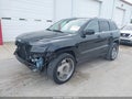 2012 Jeep Grand Cherokee — photo 2 of 16 | VIN 1C4RJFAT7CC228774