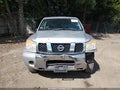 2012 Nissan Titan — photo 13 of 17 | VIN 1N6AA0EJ1CN308740