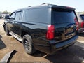2015 Chevrolet Suburban — photo 3 of 16 | VIN 1GNSKJKCXFR122411