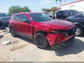 2024 Mazda CX-50 — photo 1 of 16 | VIN 7MMVABAM1RN155396