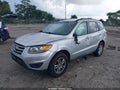 2012 Hyundai Santa Fe — photo 2 of 16 | VIN 5XYZGDAG5CG130215