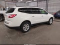 2014 Chevrolet Traverse — photo 4 of 11 | VIN 1GNKVHKD4EJ354170