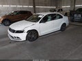 2015 Volkswagen Jetta — photo 2 of 12 | VIN 3VWD17AJ4FM425223