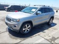2014 Jeep Grand Cherokee — photo 2 of 16 | VIN 1C4RJEBM5EC387118