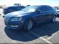 2014 Volkswagen Passat — photo 2 of 14 | VIN 1VWCT7A31EC033548