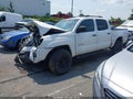 2012 Toyota Tacoma — photo 2 of 15 | VIN 3TMJU4GN1CM128637