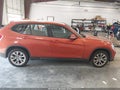 2014 BMW X1 — photo 13 of 16 | VIN WBAVL1C52EVY23174