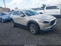 2024 Mazda CX-30 — photo 1 of 11 | VIN 3MVDMBCMXRM676951