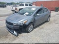 2017 Kia Forte — photo 2 of 12 | VIN 3KPFL4A70HE114944