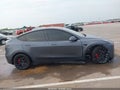 2022 Tesla Model Y — photo 6 of 19 | VIN 7SAYGDEF4NF453701