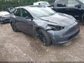 2020 Tesla Model Y — photo 1 of 19 | VIN 5YJYGDEE9LF011854