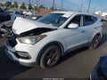2017 Hyundai Santa Fe — photo 2 of 19 | VIN 5NMZT3LB8HH011823