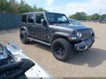 2022 Jeep Wrangler Unlimited — photo 1 of 16 | VIN 1C4HJXEN3NW126144