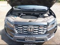 2022 Honda Passport — photo 10 of 16 | VIN 5FNYF8H6XNB001691