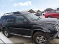 2002 Nissan Xterra — photo 14 of 17 | VIN 5N1ED28YX2C565384