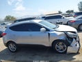 2014 Hyundai Tucson — photo 13 of 20 | VIN KM8JUCAG1EU860751