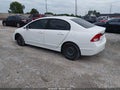 2010 Honda Civic — photo 3 of 11 | VIN 19XFA1F56AE066853